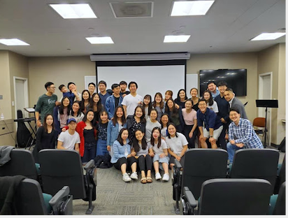 The EKCA student's in a classroom posing for a picture