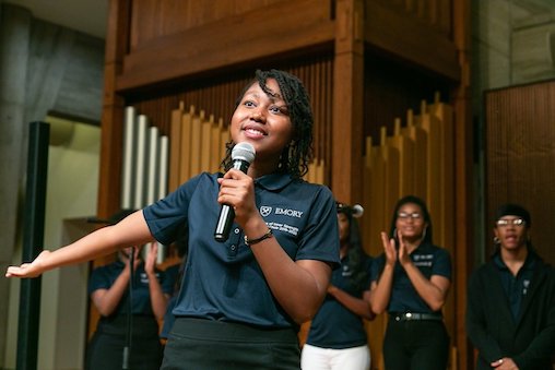 Image of the Voices of Inner Strength Gospel choir performing inside of a church