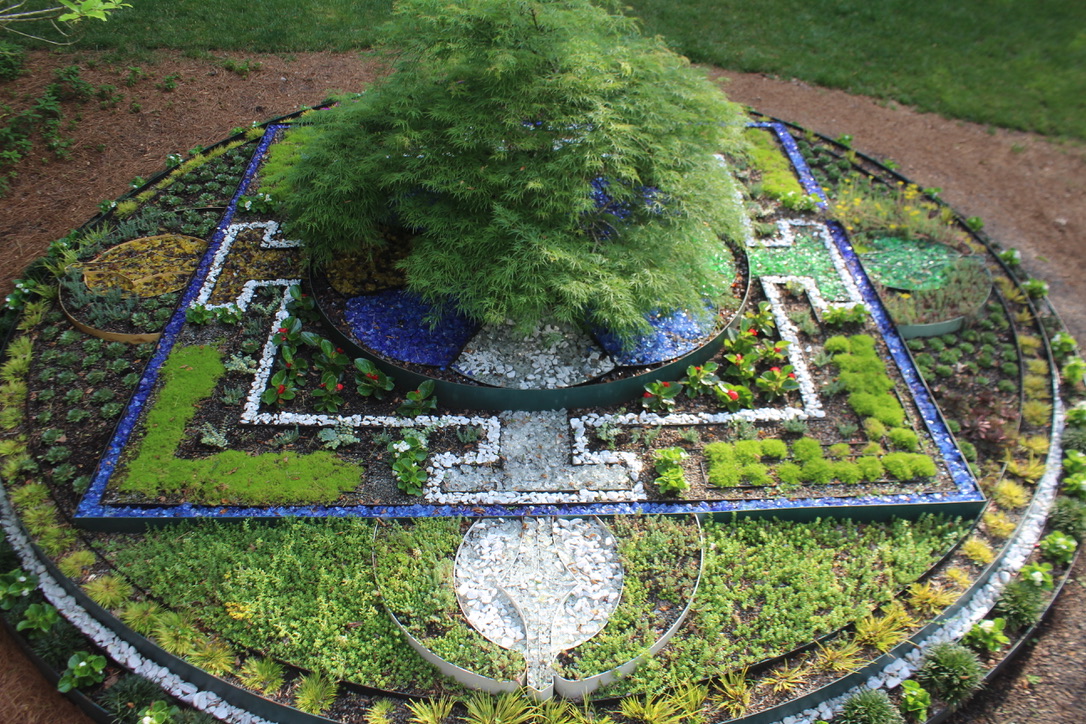 Image of a garden with a list of the meditate spaces on campus
