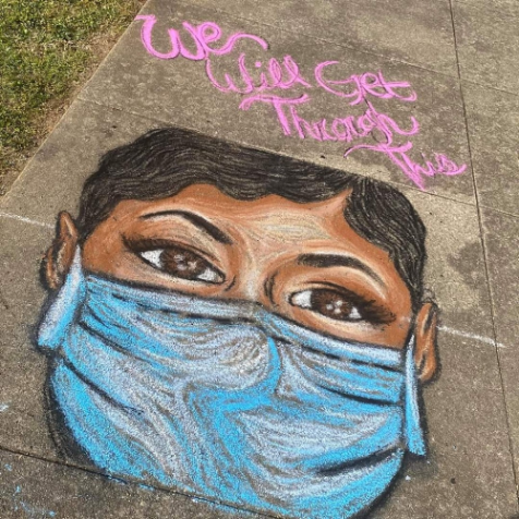 chalkboard drawing of woman with mask